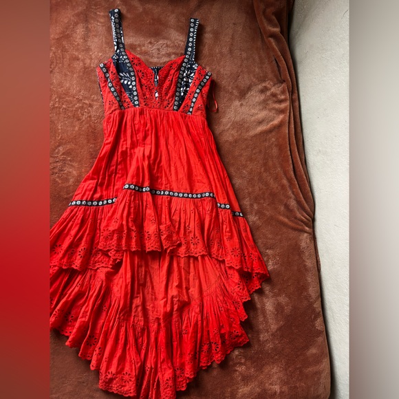 This image features the Free People Bossa Nova Eyelet High Low Dress - Picture 3 of 13